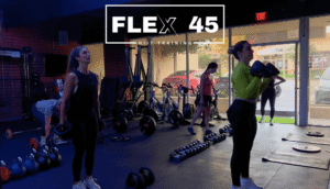 Studio Flex45 Thousand Oaks group fitness workout session with members training in a modern HIIT studio.