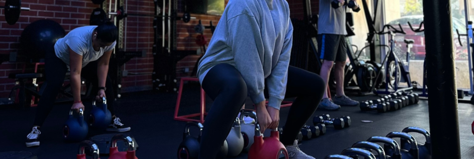Members participating in group fitness classes in Thousand Oaks at Flex45 during a high-energy HIIT workout
