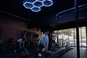 Woman performing strength training exercises in a coach-led Flex45 Thousand Oaks class