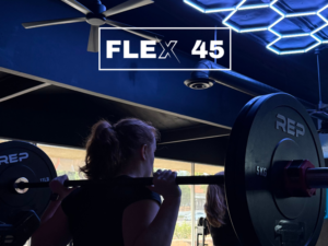 Coach leading a small group workout at a boutique fitness studio in Thousand Oaks