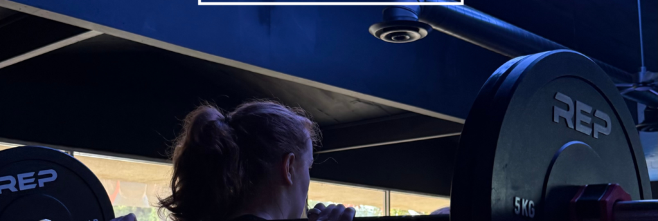 Coach leading a small group workout at a boutique fitness studio in Thousand Oaks