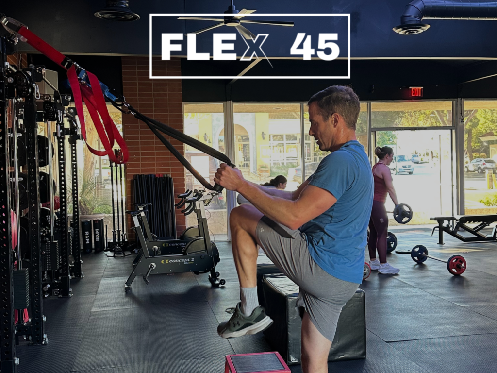 Group workout class at a fitness studio near Westlake Village led by a coach