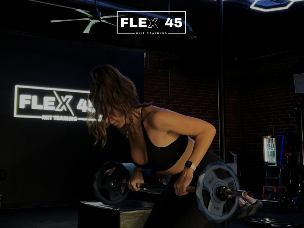 Coach guiding a group through a structured workout during guided fitness training in Thousand Oaks